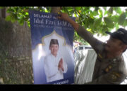 Banpol PP Turunkan Banner Balongub