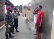 Tak Pakai Masker Warga Disanksi Menyanyi