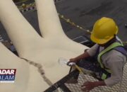 BANDARLAMPUNG : Noda Di Patung Tangan Pengantin Bukan Retak Tapi Gumpalan Lumut Tebal