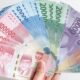 Rupiah Terkoreksi ke Rp18.174 per Dolar AS, Pasar Keuangan Tertekan
